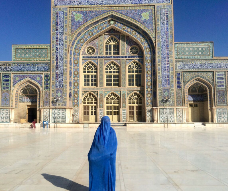 Wearing a traditional blue burqa in Herat, north-western Afghanistan