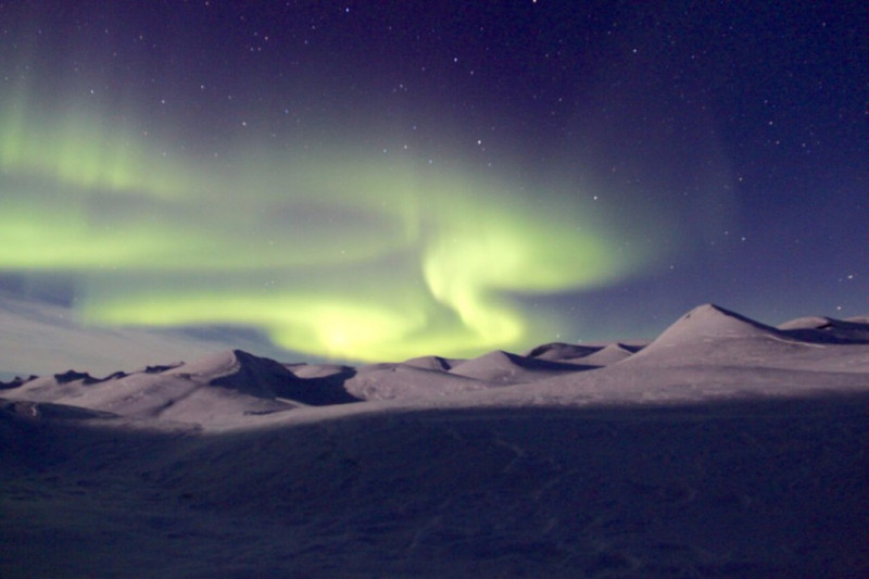 Brilliant display of Northern Lights while camping on the Greenlandic ice cap