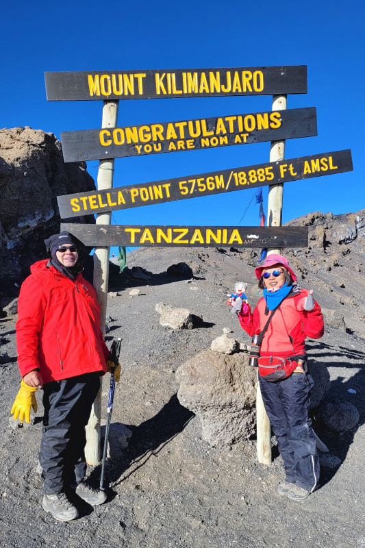 Ernestine Chan posing on the top of Kilimanjaro