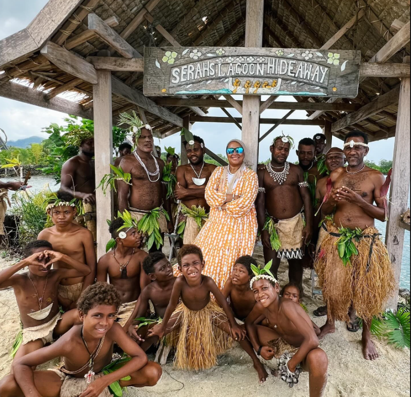 Bahraini Traveller Rasha Yousif posing with a tribe from Solomon Islands