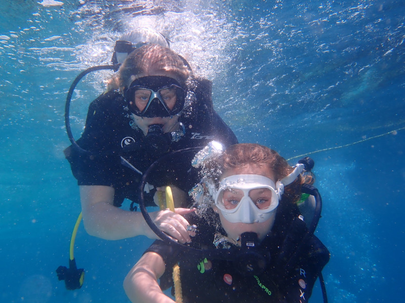 Merete and her daughter diving in the Maldives