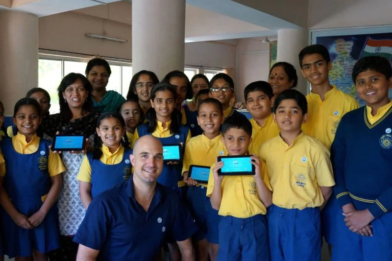 With schoolchildren in India