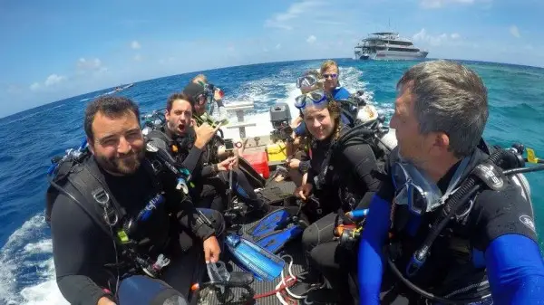 Mike aboard the tender headed to a dive site on the Great Barrier Reef in Australia. We made some terrific friends on this trip who live all over the world and who we meet up with whenever we can