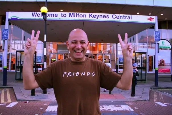 This incredibly tacky photo of the author is taken at Milton Keynes Central station, which is where a very significant meeting in Chapter 13 takes place