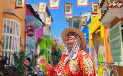 Rasha Yousif Bahraini Female Traveller posing on a colourful street in Colombia