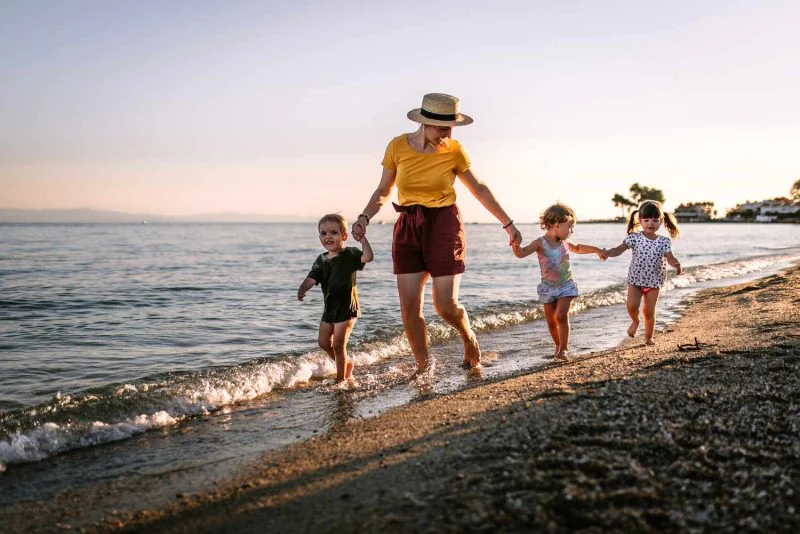 travelling with children - family on a beach